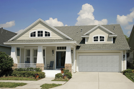 Residential home before Clopay garage door upgrade