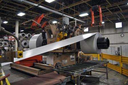 Steel garage door being made in the Clopay garage doors factory