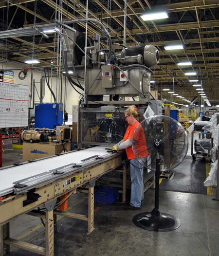 Clopay employee working In the Clopay garage doors factory