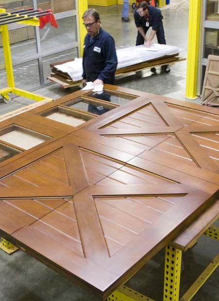 Clopay wood garage doors being made in Clopay’s wood manufacturing facility.