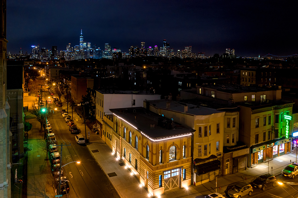 drone view with NYC skyline of Anthony Carrino's home project