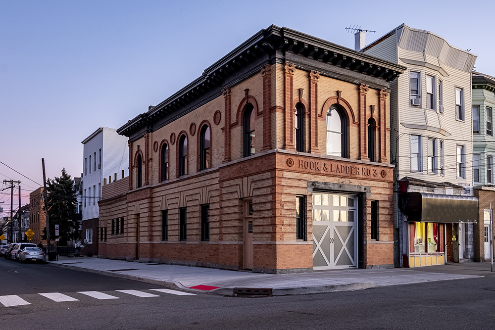 Exterior shot at dusk of the Anthony Carrino project