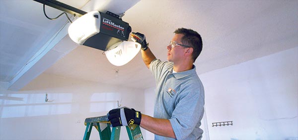 Homeowner checking the garage door opener